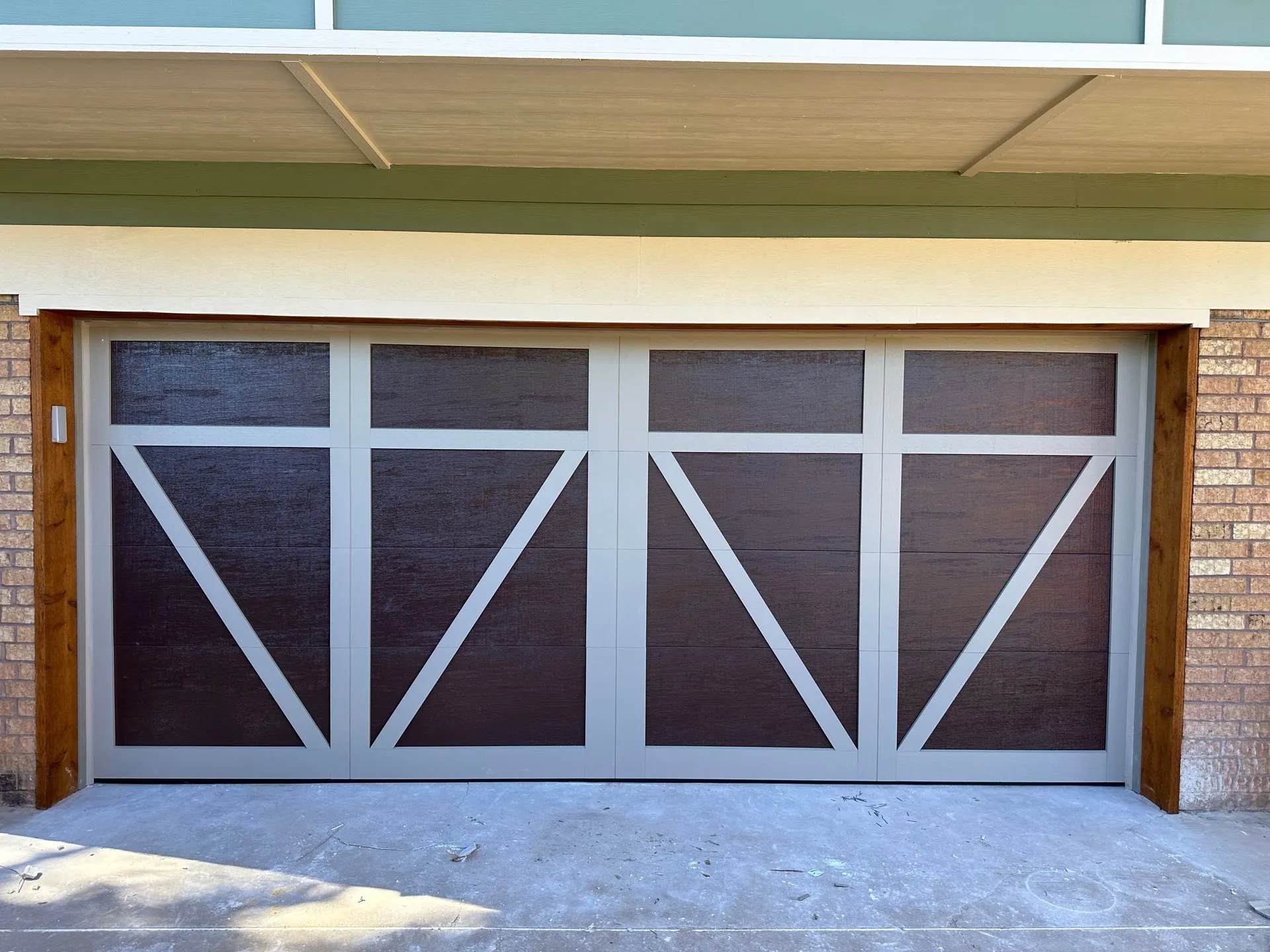 Wood and white residential garage door